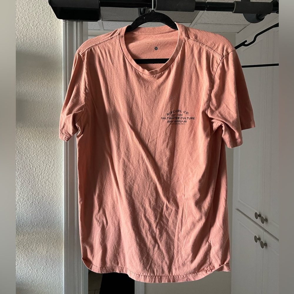Medium orange rip curl top